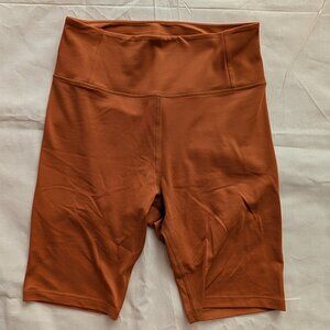 Girlfriend Collective Orange Bike Shorts (medium)
